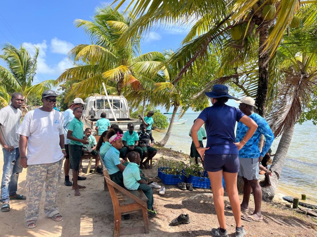 A school group and CMARI researchers gathering together to talk about the activity.